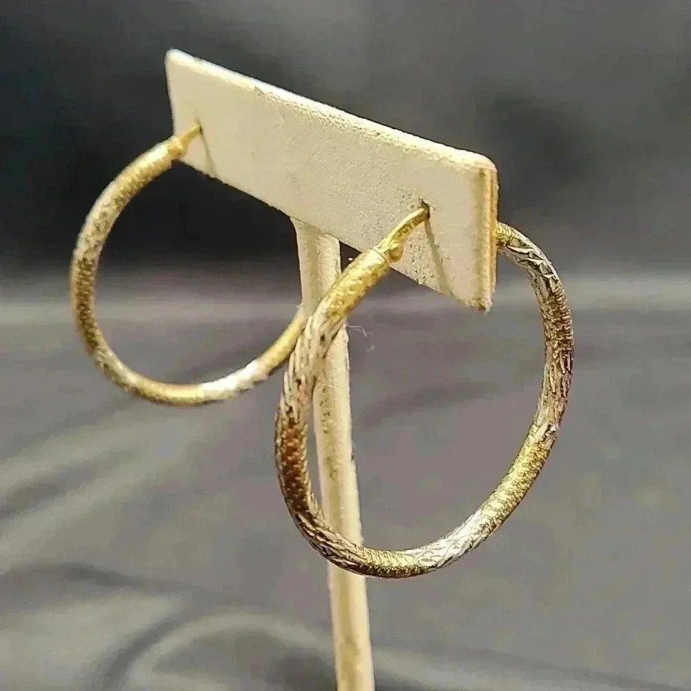 Textured 1 and 1/2 in sterling silver hoop earrings